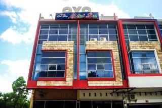 OYO 1192 Lotus Inn - Pekanbaru - 4