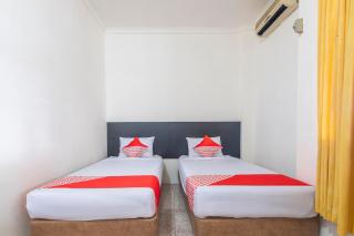 Super OYO 2704 Hotel Transit 2 - Makassar - 7