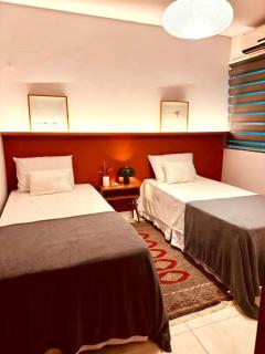 Descubra a Casa Felicidade em Belém! Climatizada, com sala ampla, 2 quartos, mezanino e Wi-Fi veloz. Localização central perto de atrações e gastronomia. Viva a Amazônia com conforto exclusivo. Reserve já sua experiência inesquecível! - 8