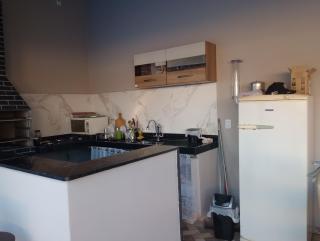 Casa e Área de lazer em Rubião Júnior - 1