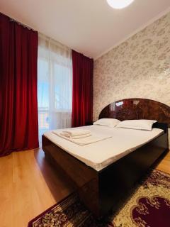 153 В ТОП-ЛОКАЦИИ очень теплая и уютная квартира с ПОТРЯСАЮЩИМ видом на Байтерек с 2 большими кроватями и диваном - 9