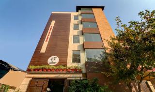 Treebo 12 Degrees West, 750 Mts From Embassy Golf Links Business Park - Bangalore - 0