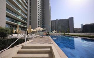 Promo Stylish 1BR City Living at Reva Residences by Deluxe Holiday Homes - 1