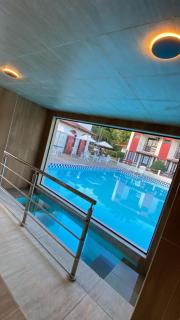 Casas com 2 ou 3 suítes (todas com ar split), com internet privativa 300MBPSno Residencial Nazareth, localizado a aproximadamente 80m da praia de Taperapuã (Arena Axé moi), com piscina, sauna, portaria 24hrs - Porto Seguro - 8