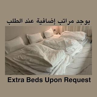 شقة بأثاث مريح ثلاث غرف نوم - 2
