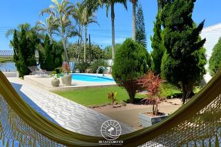 Casa em Torres-RS - Em frete Lago do Violão - Piscina - Ar condicionado suíte - Churrasqueira - Varanda com vista lago - vaga para carros - Pátio privativo - Aceita Pet - Torres - 4