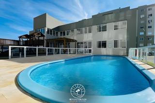 Apto alto padrão em Torres-RS - 03 quartos com ar-condicionado - Churrasqueira - Smart Tv - Wifi - Lavanderia - Piscina - Garagem para carro - 3 min do mar - 7