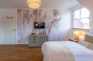 5 Sterne Ferienhaus Ostseenest mit Boddenblick - 3