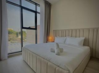 Serene Green Escape and Stunning Views in DAMAC Hills 1 by Bhavan Vacation Homes - 2