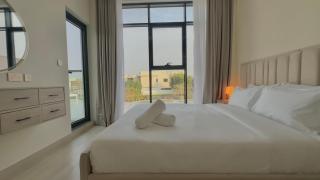 Serene Green Escape and Stunning Views in DAMAC Hills 1 by Bhavan Vacation Homes - 9