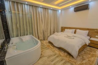 Chic Cozy Retreat with Jacuzzi next to AUC - 9