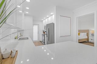 Waterfront Oasis 2BR 2BA with Pool, Gym, Balcony & Parking - 4