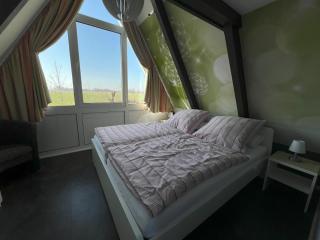 Nurdachhaus mit Blick ins Grüne- ruhige Lage nahe Yachthafen Fedderwardersiel - Fedderwardersiel - 3