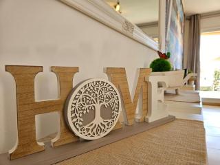 Apartamento con Patio Privado, Piscina Comunitaria y Parking en Miami Playa - ES-9-169 - Les Planes del Rei - 1