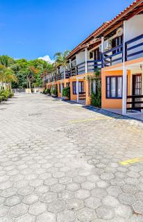 Casas com 2 suítes (ambas com ar split) e internet privativa 300MBPS, no Residencial Village do Bosque, condomínio com quiosques com churrasqueiras , piscina, sauna portaria 24hrs, a aproximadamente 200m da praia de Taperapuã Axé Moi - Porto Seguro - 1