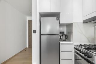 Modern 1BR Apartment - JVC - WiFi - Pool - Gym - 2