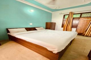 Capital O Kanha Guest House - Noida - 7
