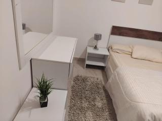 Modern Two-Bedroom Apartment with Garden View - Madinaty - 7