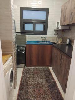 Modern Two-Bedroom Apartment with Garden View - Madinaty - 6