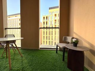 The Minimal Beauty Balcony by BlueCloud holidays - Sharjah - 8