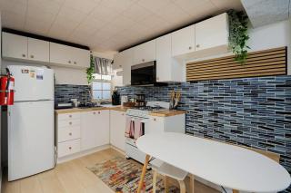 Beach Block 2-Bed with Coastal Palm Trees and Yard - Pacifica - 8