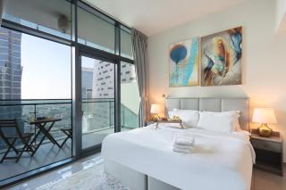 Livbnb Suites - Bright 1 BR Suite in Merano Tower - Dubai - 8