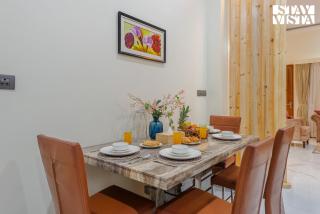 StayVista at 27 Flora with Lawn, Pool, WiFi - Nagaon - 6