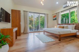 StayVista at 27 Flora with Lawn, Pool, WiFi - Nagaon - 5