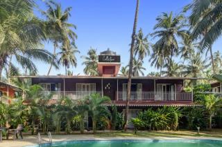 Capital O Coco Farm Resort - Morjim - 2