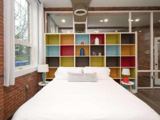 Jennifer's Historic Loft Glass Bedroom - 1