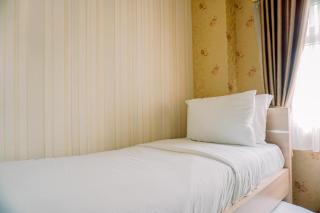 Comfort Stay 2BR at Green Pramuka City Apartment By Travelio - 1