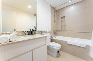 Community View 1BR, Minutes Drive to Al Qudra Camp Site, Town Square Zahra Breeze 3A, Dubailand by Deluxe Holiday Homes - 2