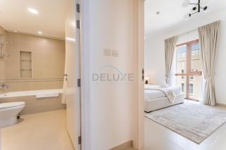 Community View 1BR, Minutes Drive to Al Qudra Camp Site, Town Square Zahra Breeze 3A, Dubailand by Deluxe Holiday Homes - 1