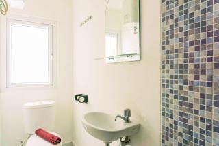 Homey and Tidy Studio Room Aeropolis Apartment By Travelio - Tangerang - 1
