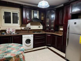 Luxurious Apartment in the Heart of Mohandessin - Cairo - 8