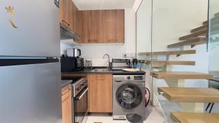 Rooftop Luxury 2BR Haven with Jacuzzi in Masdar city - Abu Dhabi - 1