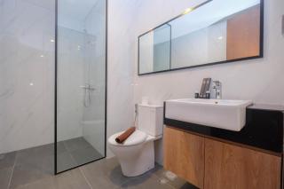 Minimalist and Homey 1BR at Ciputra World 2 Apartment By Travelio - 7