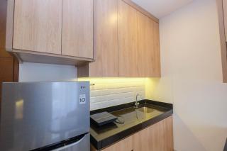 Minimalist and Homey 1BR at Ciputra World 2 Apartment By Travelio - 1