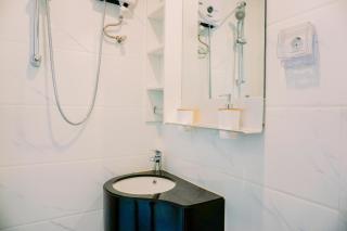 Minimalist and Nice Studio at Sky House Alam Sutera Apartment By Travelio - 1