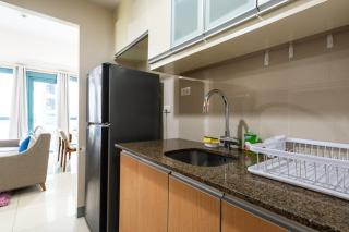 One Uptown Residence BGC 2BR Cor unit with balcony ,washer - 9