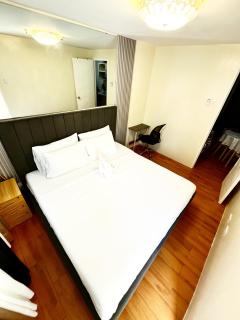 Cozy Suites 2BR Condotel in Davao City Near airport, Sasa wharf going to samal, SMX SM lanang - Davao City - 9