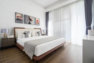 Comfortable three-bedroom and one-living room garden view suite - kitchen - living room - balcony - refrigerator and washing machine - Sanya - 9