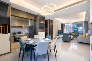 Comfortable three-bedroom and one-living room garden view suite - kitchen - living room - balcony - refrigerator and washing machine - Sanya - 4