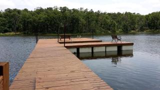 Spacious and Secluded Luxury Rental Overlooking a Glittering Private Lake in Konawa, Oklahoma - 1