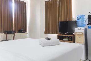 Cozy Studio at Elvis Tower Apartment By Travelio - Bekasi - 8