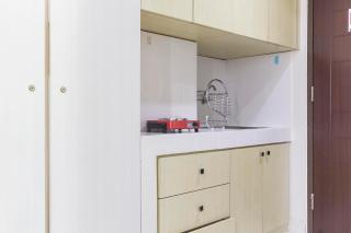 Cozy Studio at Elvis Tower Apartment By Travelio - Bekasi - 3