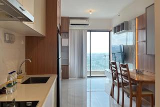Sora by TwoSpaces 2BR at Skyhouse Apartment - Samporo - 5
