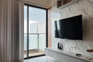 Sora by TwoSpaces 2BR at Skyhouse Apartment - Samporo - 2