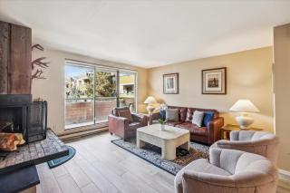 Riverside Condo, with a Pool & Hot Tub - Steps to Town - 0