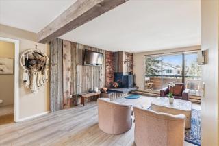 Riverside Condo, with a Pool & Hot Tub - Steps to Town - 8